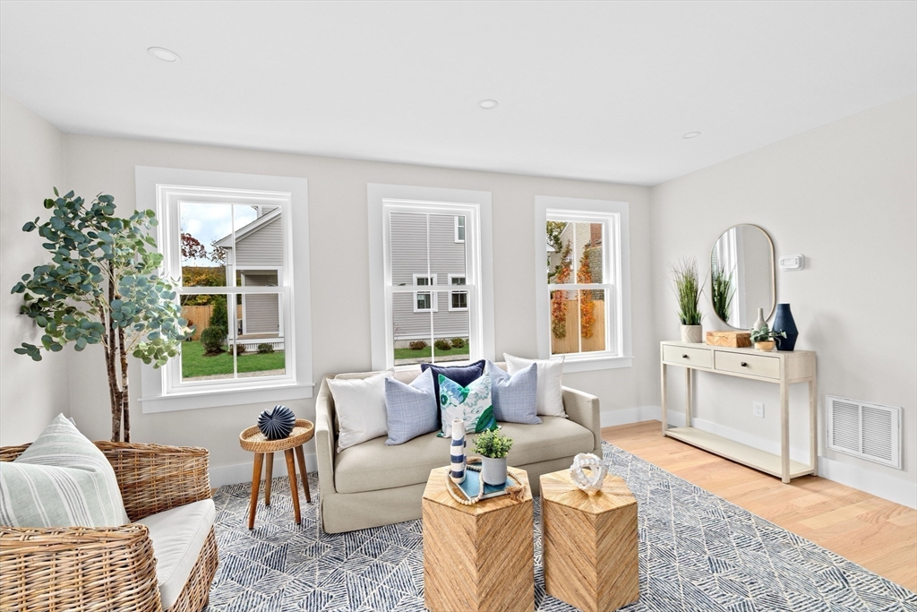 19 Ford Place, Unit 3 Scituate, MA 02066 - Photo 15 of 41 a living room with furniture and a large window