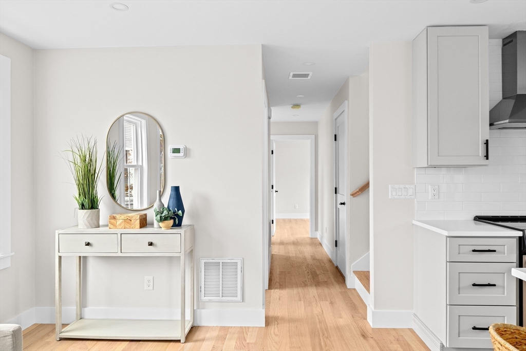 19 Ford Place, Unit 3 Scituate, MA 02066 - Photo 17 of 41 a view of living room with furniture and mirror