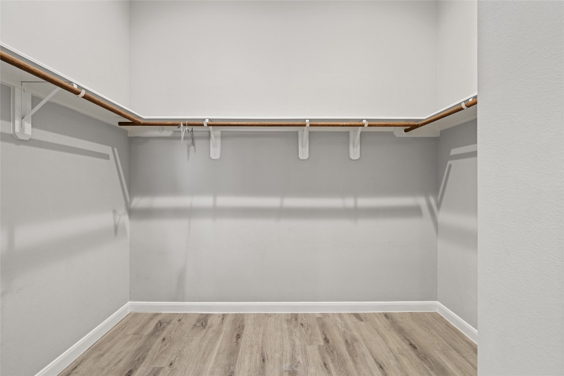 5610 Patrick Street, Unit L Houston, TX 77076 - Photo 20 of 28 a view of an empty walk in closet