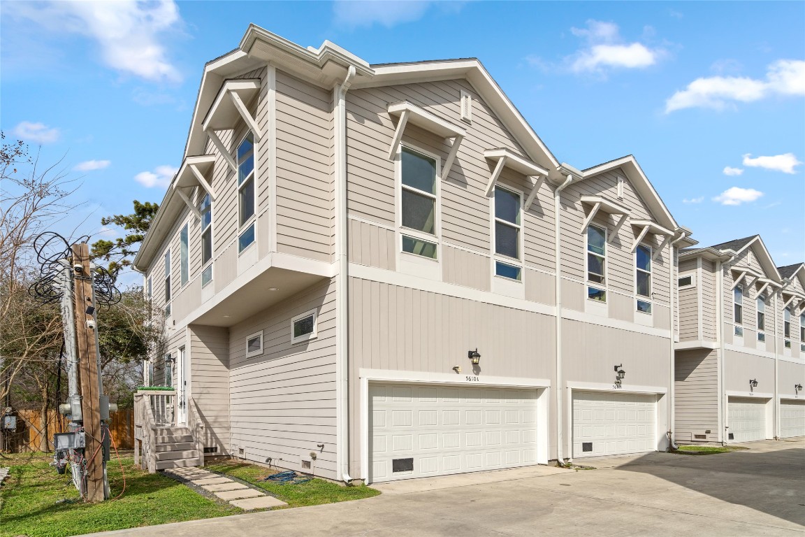 5610 Patrick Street, Unit L Houston, TX 77076 - Photo 5 of 28 a front view of a building with a street