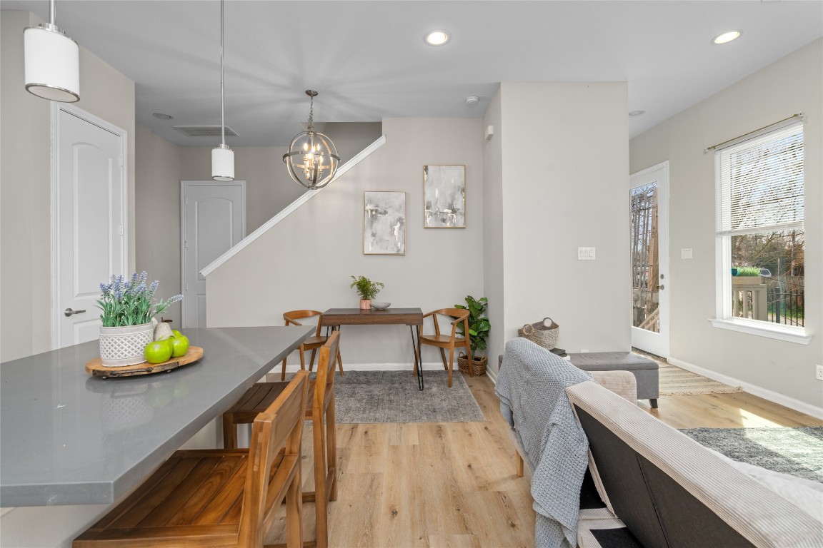 5610 Patrick Street, Unit L Houston, TX 77076 - Photo 10 of 28 a very nice looking dining room with a dining table and chairs