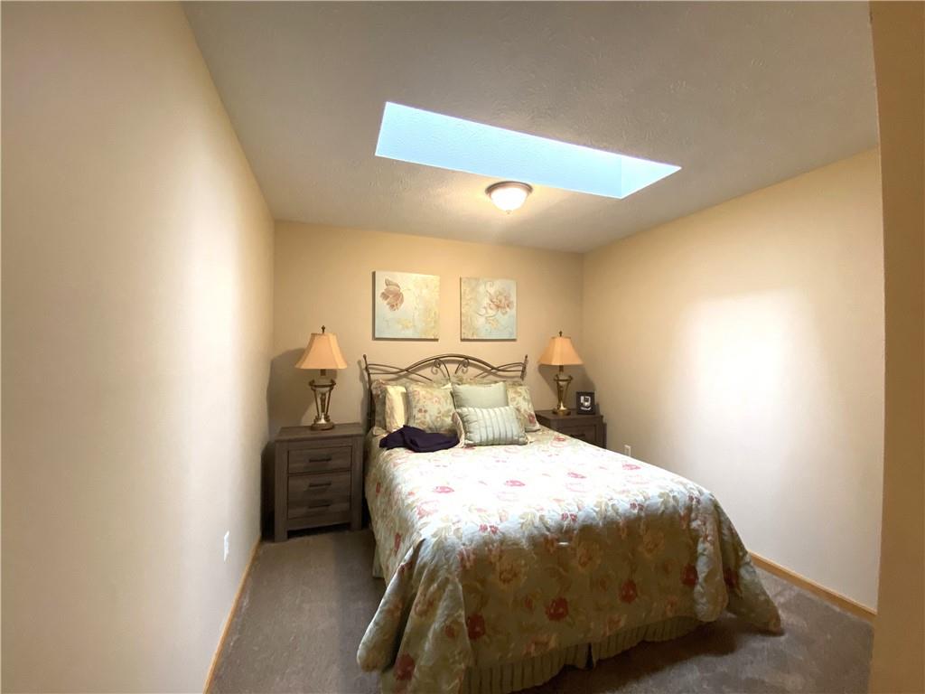 725 Rollinson Road Hermitage, PA 16148 - Photo 19 of 26 a bedroom with a bed and a night stand