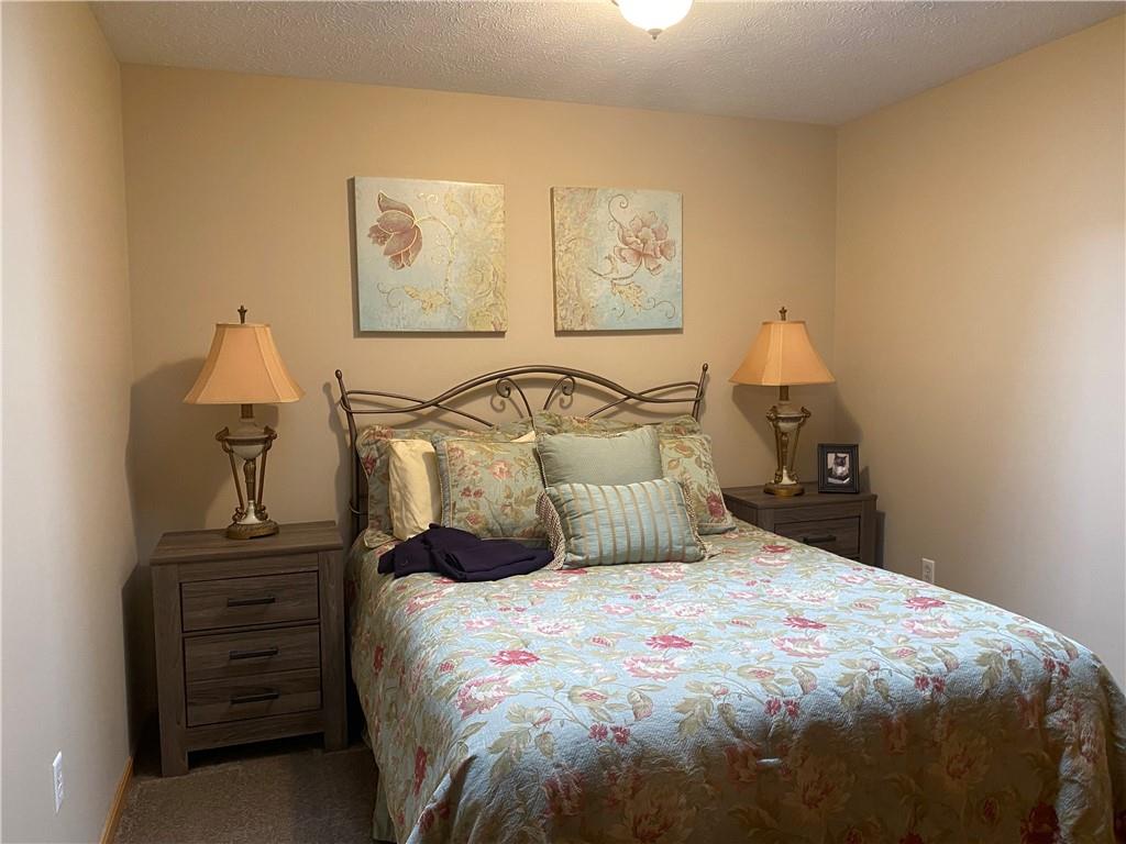 725 Rollinson Road Hermitage, PA 16148 - Photo 20 of 26 a bedroom with a bed and painting on the wall