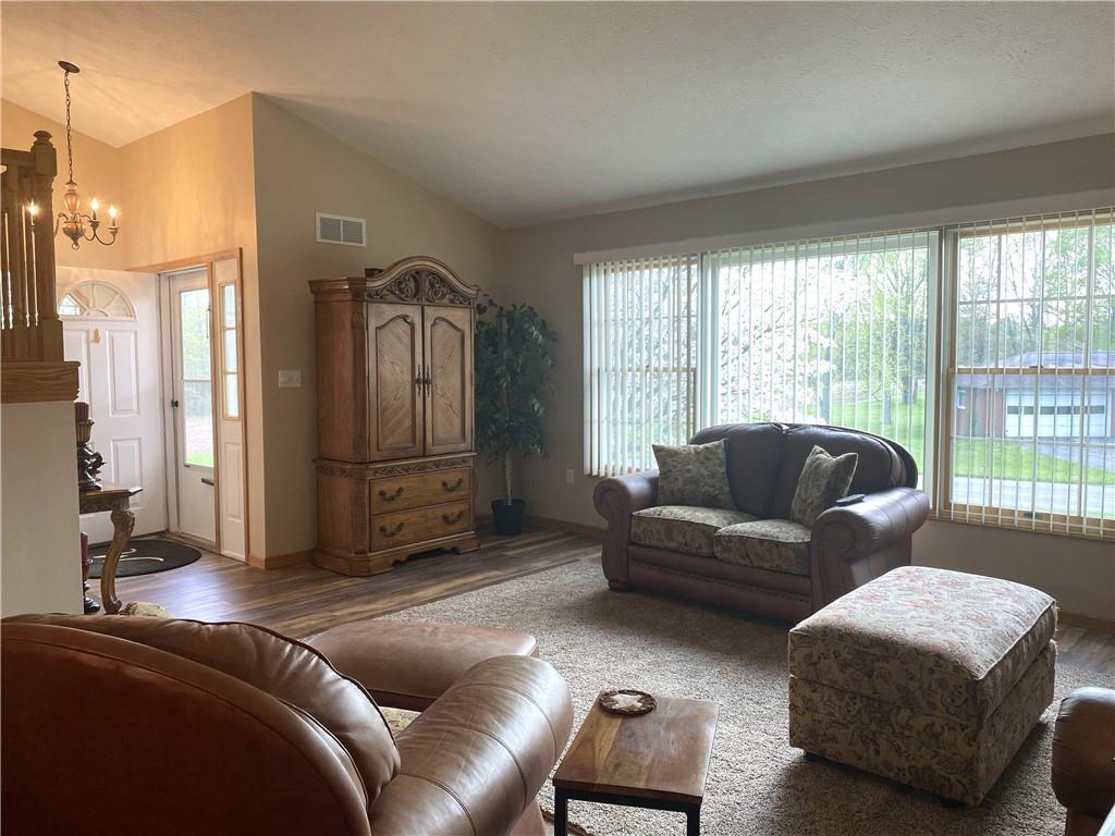 725 Rollinson Road Hermitage, PA 16148 - Photo 5 of 26 a living room with furniture and a window