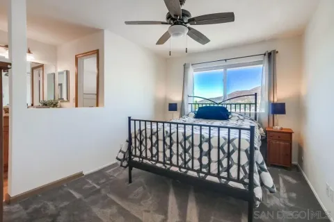 a view of a balcony with wooden floor