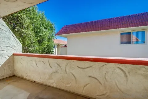 a view of a building from a balcony