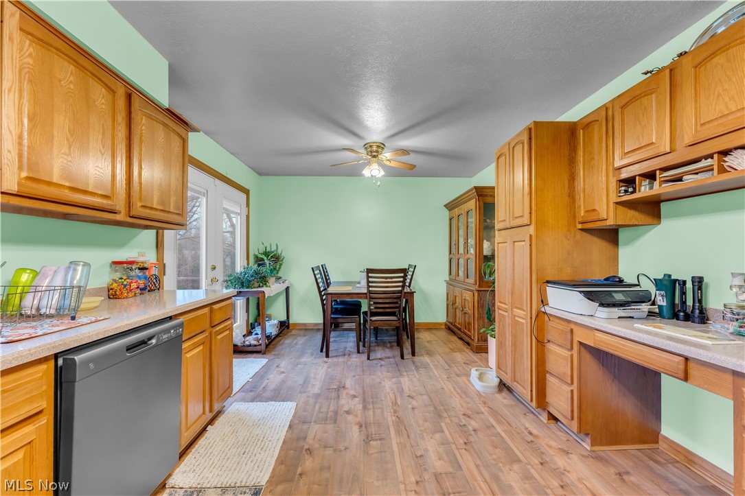 9642 Crow Road Litchfield, OH 44253 - Photo 22 of 50 Bedroom with light hardwood / wood-style floors and ceiling fan