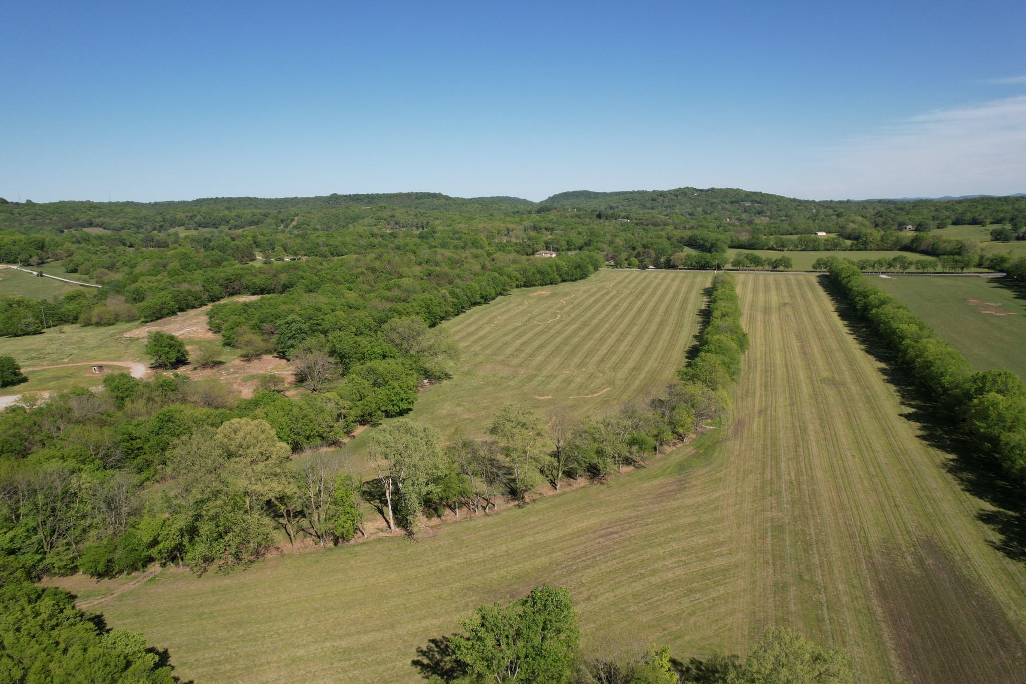 3 Trinity Road Franklin, TN 37067 - Photo 3 of 19 a view of a lake with a mountain in the background