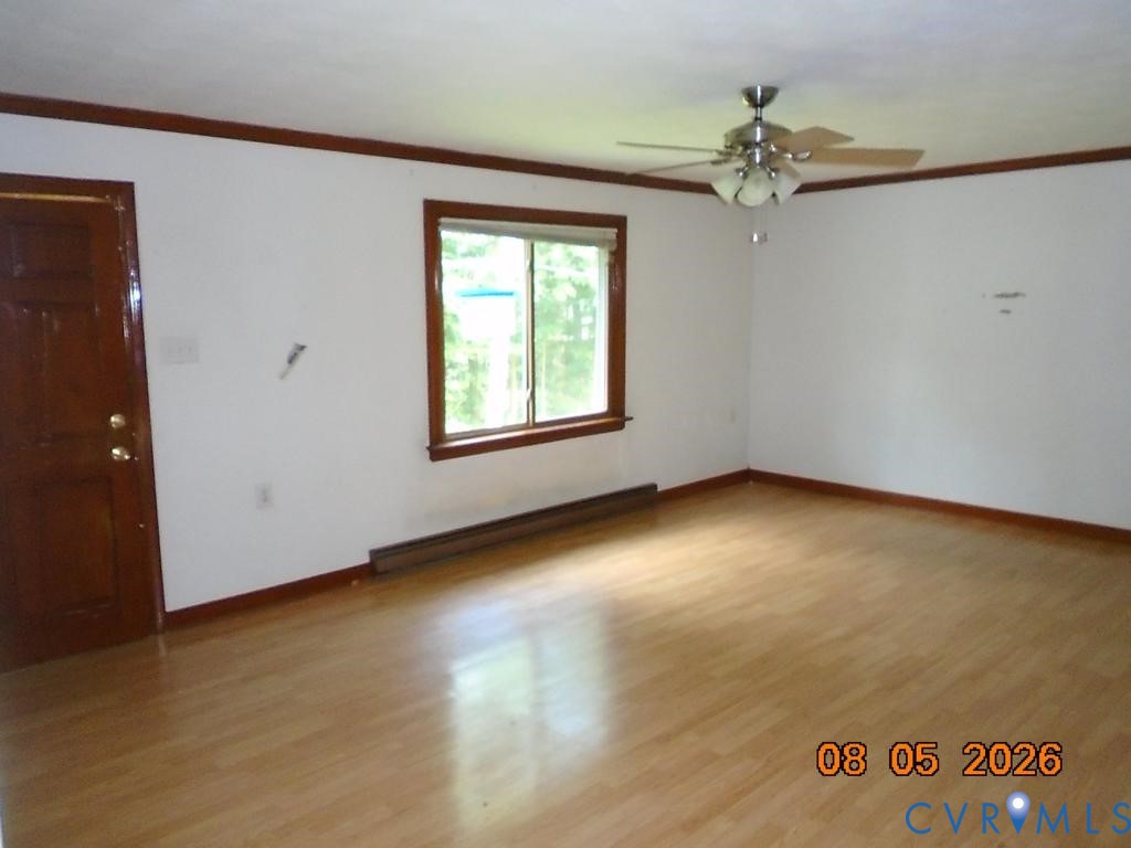 6256 Hickory Road Quinton, VA 23141 - Photo 9 of 16 Wood-finish flooring, white walls, and a ceiling f