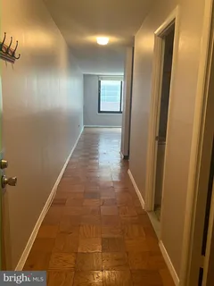 a view of hallway with windows