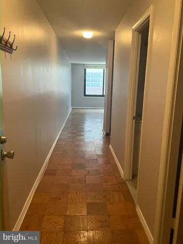 a view of hallway with windows