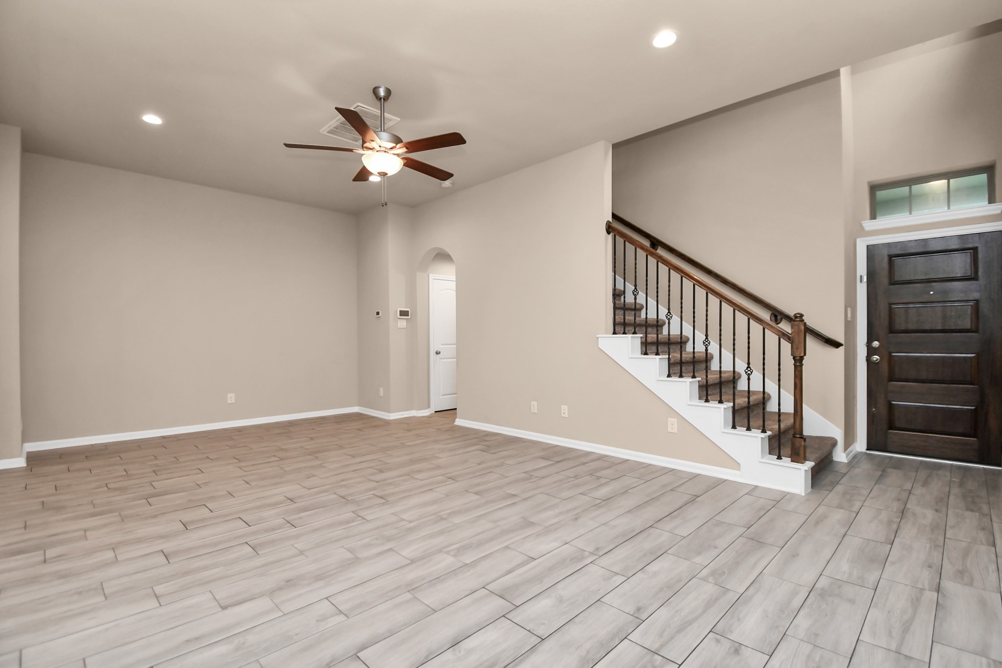 4220 Merry Mill Drive Spring, TX 77386 - Photo 17 of 44 wooden floor in an empty room with a window