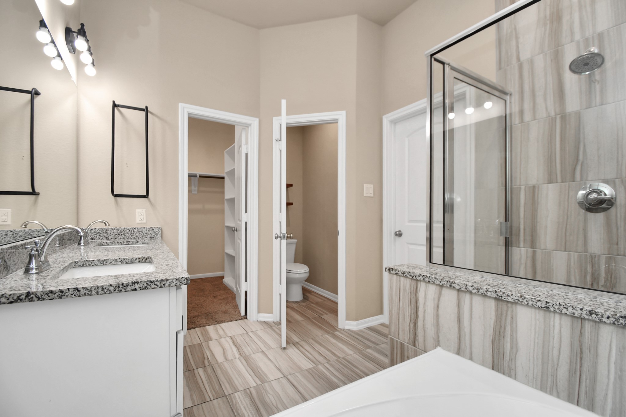 4220 Merry Mill Drive Spring, TX 77386 - Photo 28 of 44 a bathroom with a sink and a mirror