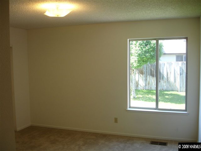 4348 Pescado Way Reno, NV 89502 - Photo 6 of 9 a view of a room that has a window in it