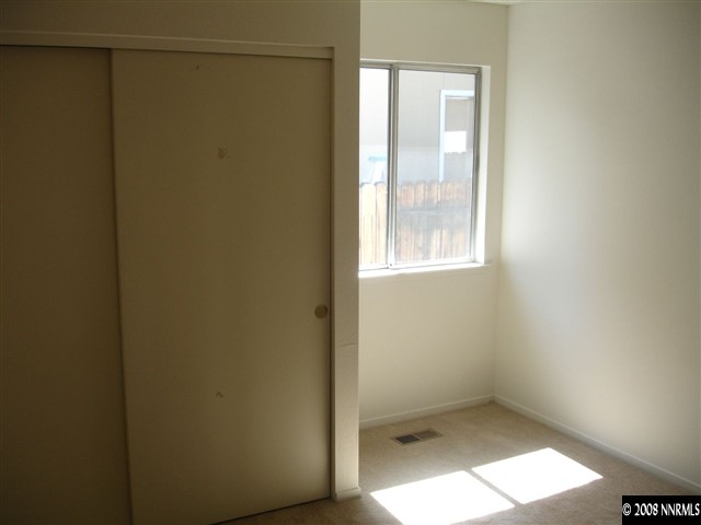 4348 Pescado Way Reno, NV 89502 - Photo 8 of 9 a bathroom with a window