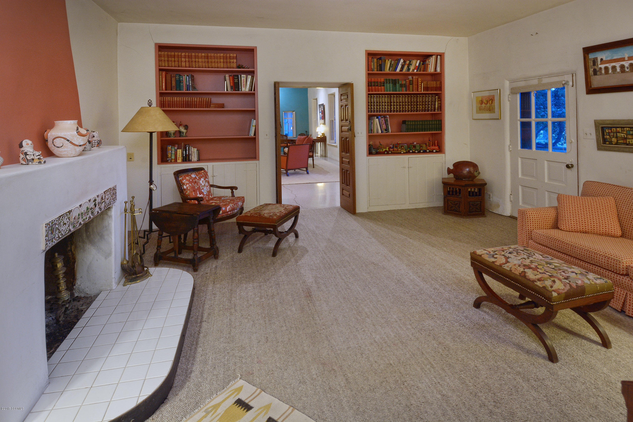 87 Clark Crossing Road Rio Rico, AZ 85648 - Photo 13 of 51 a living room with furniture and a fireplace
