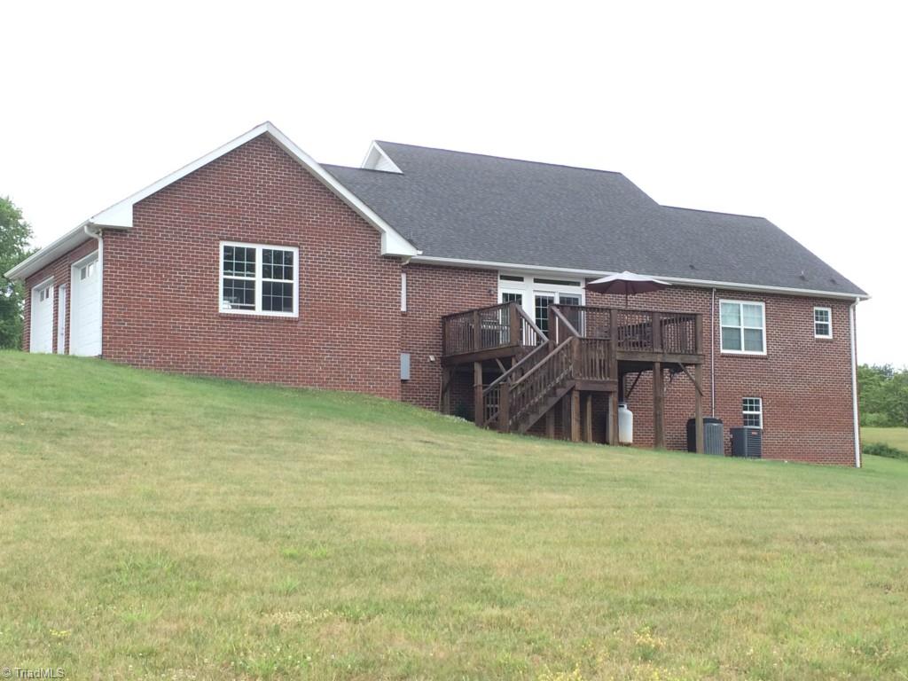 794 Sheep Farm Road Mount Airy, NC 27030 - Photo 3 of 30 Solid brick, maintenance free exterior.