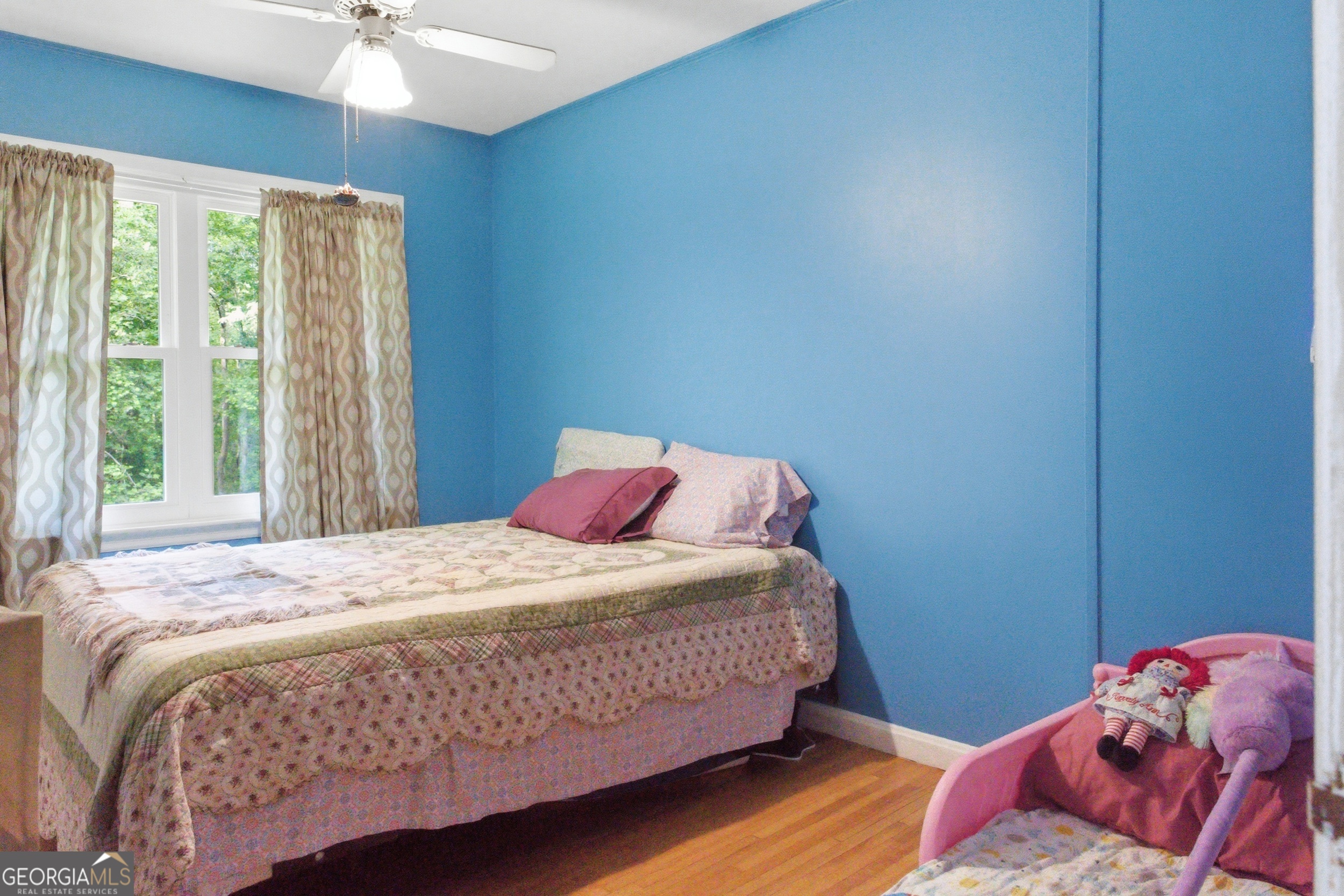 169 Pinecrest Road North Toccoa, GA 30577 - Photo 19 of 55 a bedroom with a bed and a window