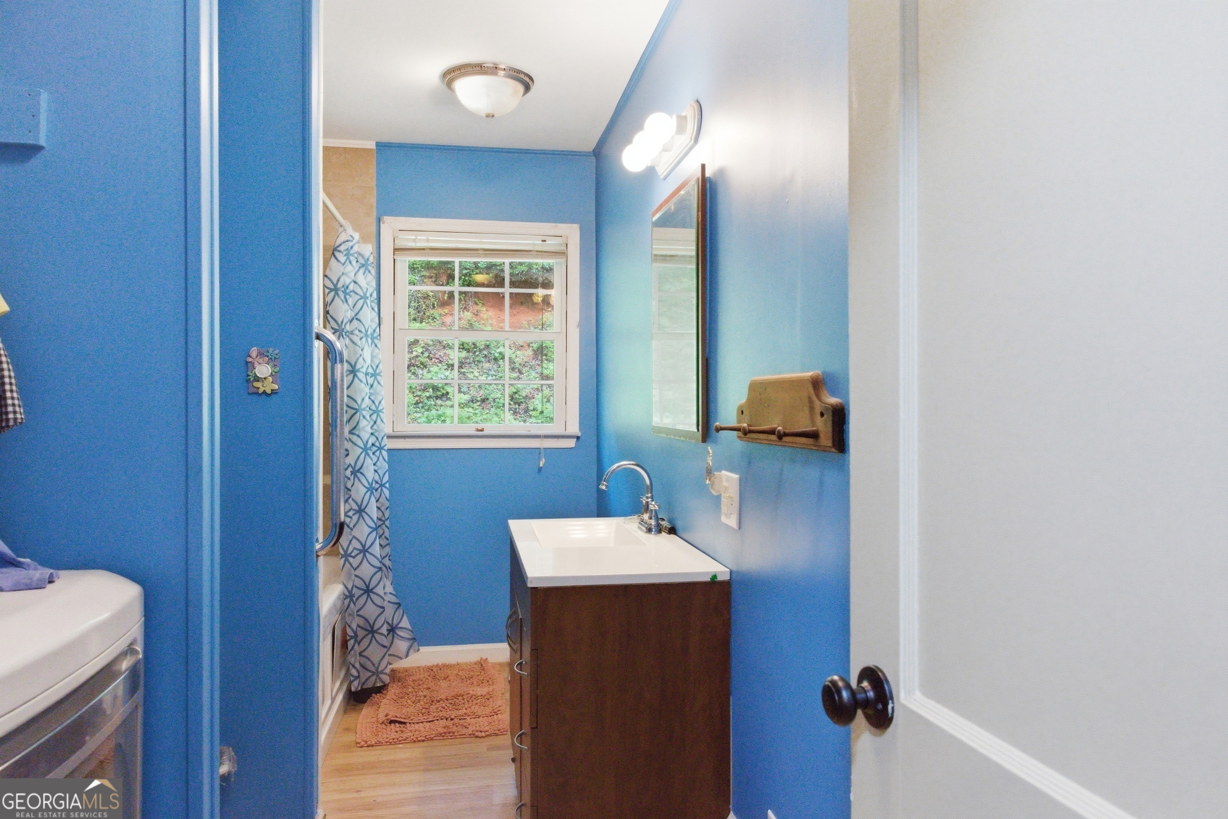 169 Pinecrest Road North Toccoa, GA 30577 - Photo 27 of 55 a bathroom with a sink and a mirror