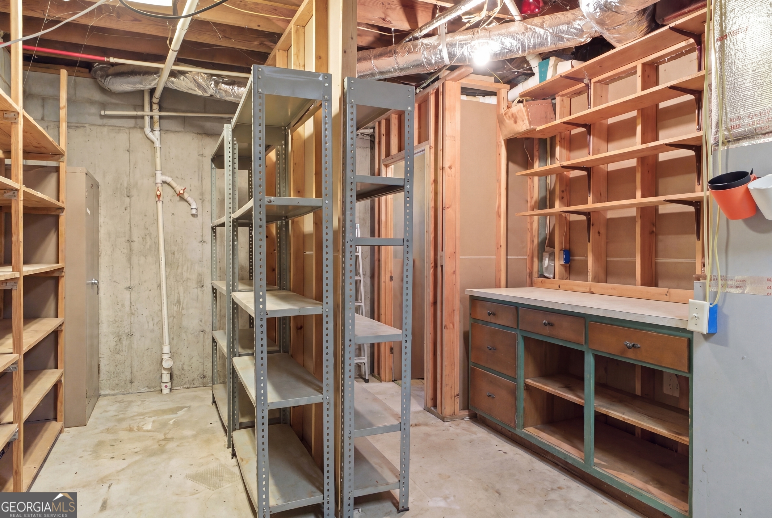 169 Pinecrest Road North Toccoa, GA 30577 - Photo 39 of 55 a view of walk in closet with empty racks