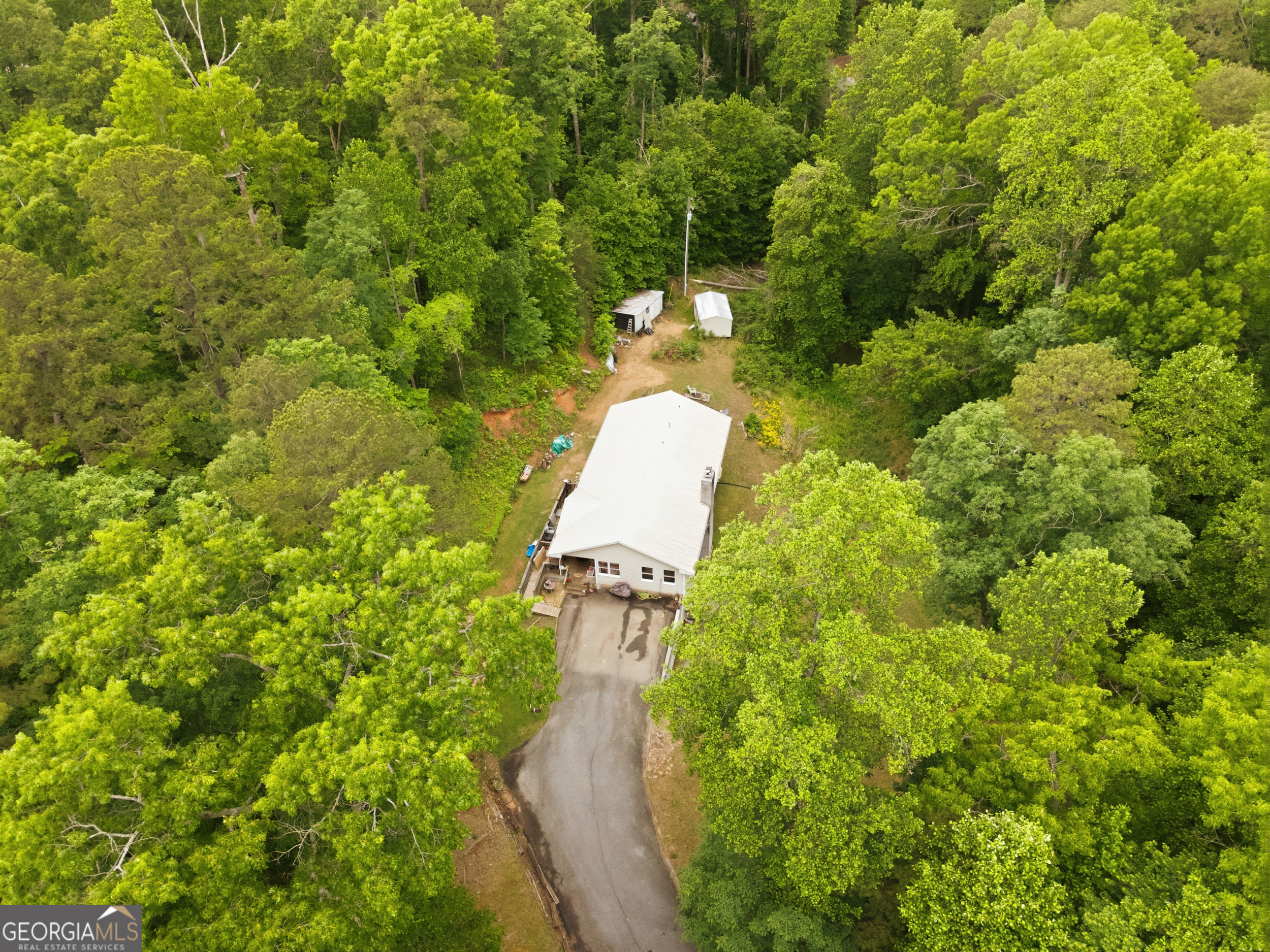 169 Pinecrest Road North Toccoa, GA 30577 - Photo 43 of 55 a aerial view of a house with a yard and garden