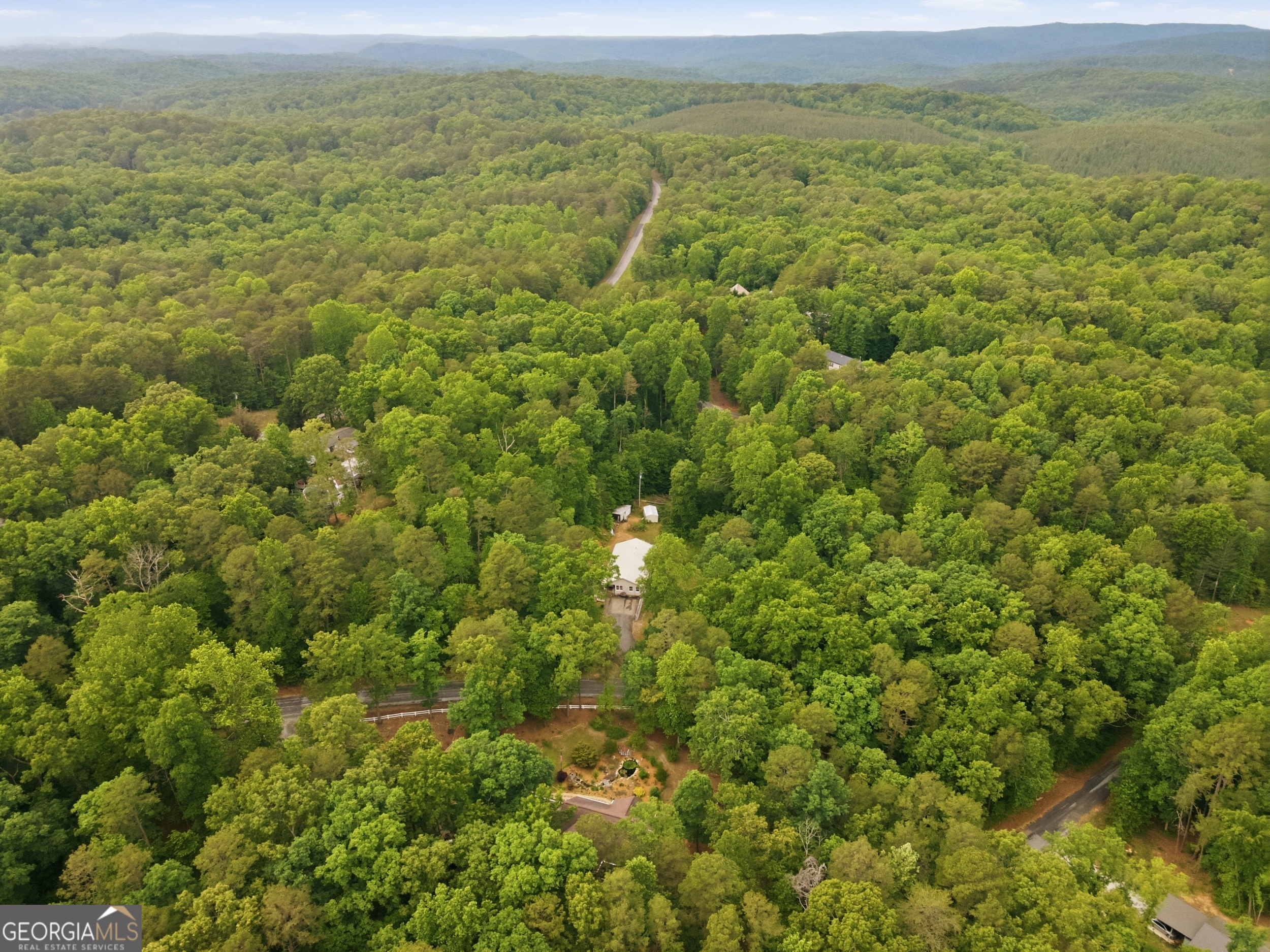 169 Pinecrest Road North Toccoa, GA 30577 - Photo 48 of 55 a view of a green field with an ocean view