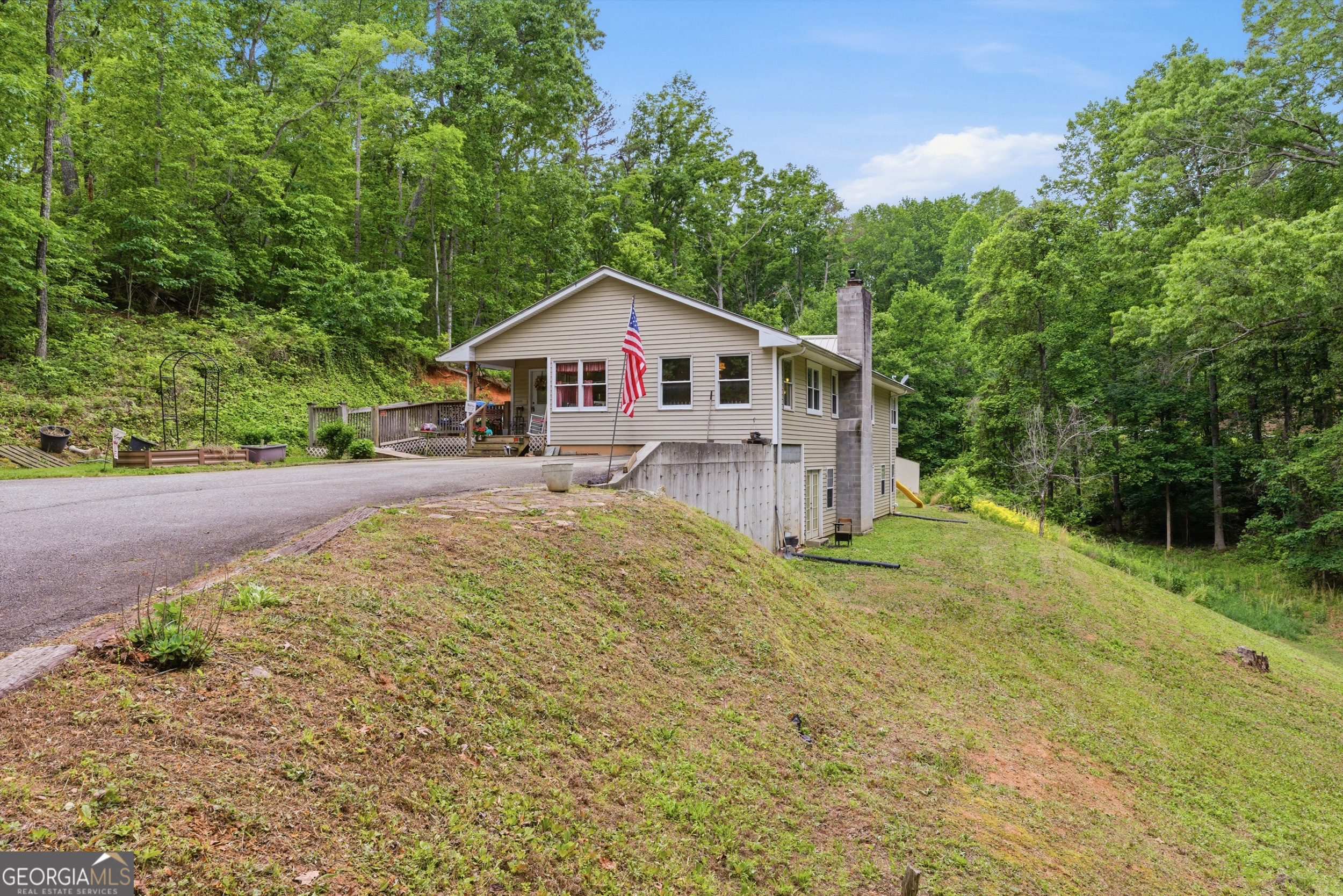 169 Pinecrest Road North Toccoa, GA 30577 - Photo 52 of 55 a house with trees in the background