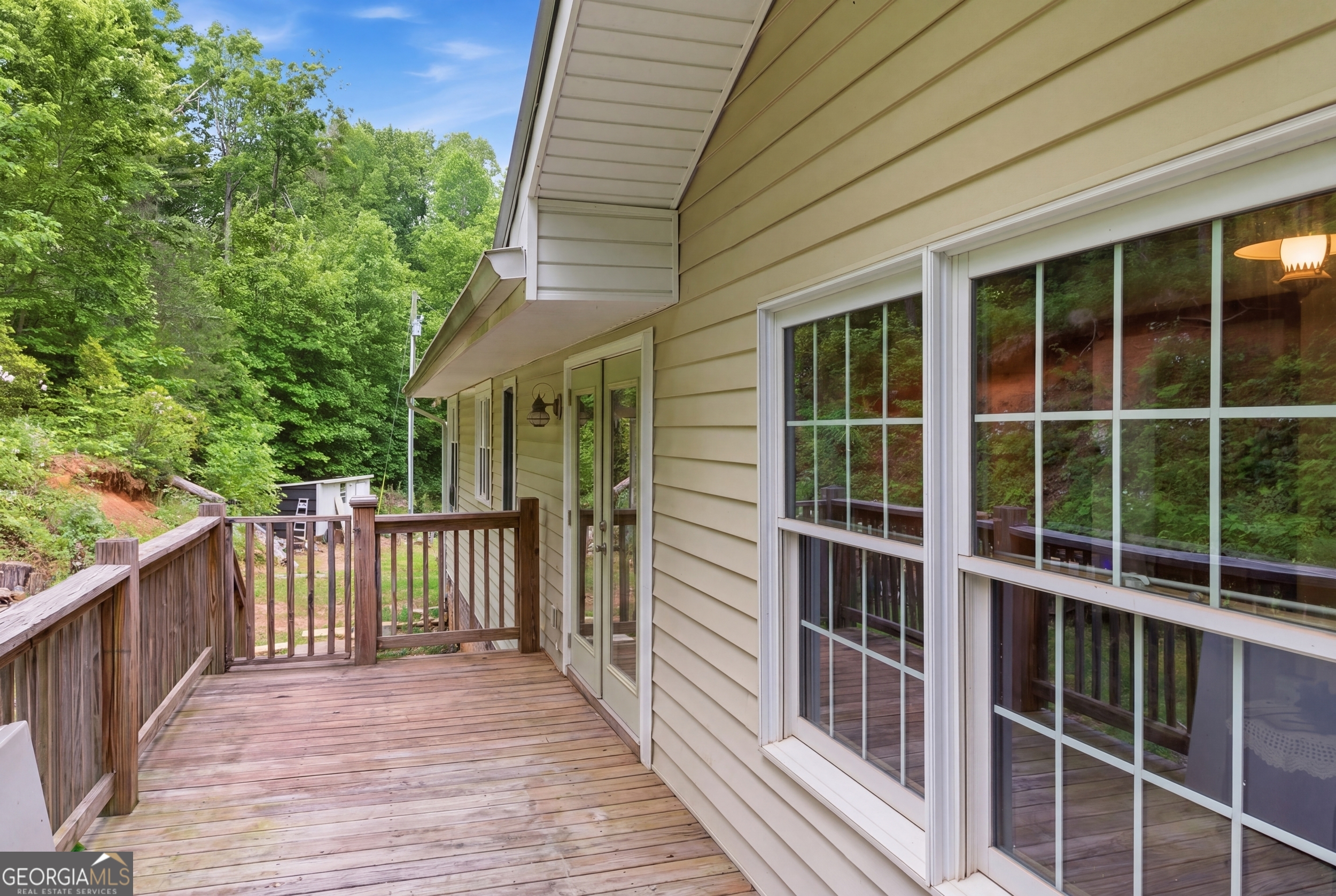 169 Pinecrest Road North Toccoa, GA 30577 - Photo 6 of 55 a view of a house with backyard and deck