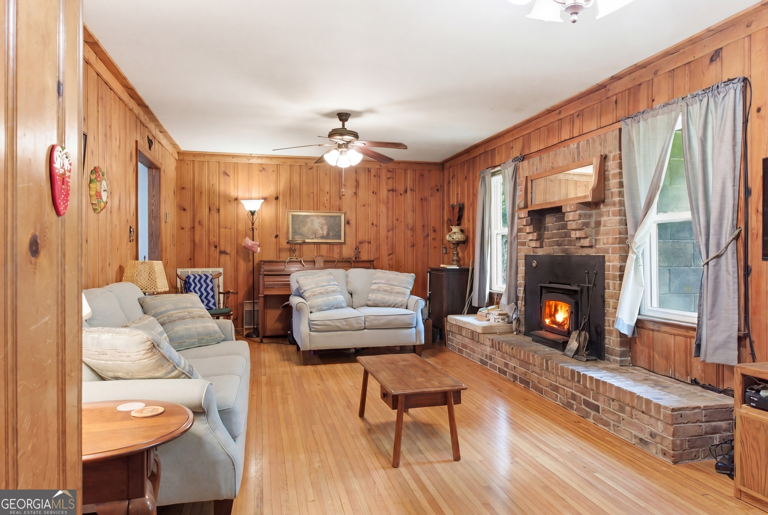 169 Pinecrest Road North Toccoa, GA 30577 - Photo 10 of 55 a living room with furniture and a fireplace
