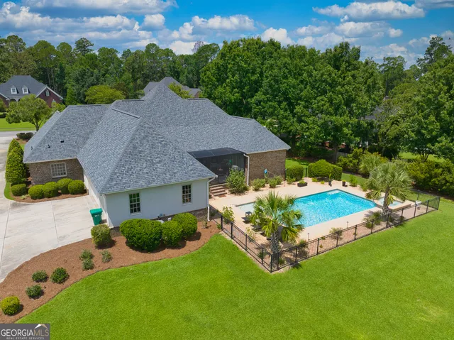 a living room with furniture fireplace and flat screen tv