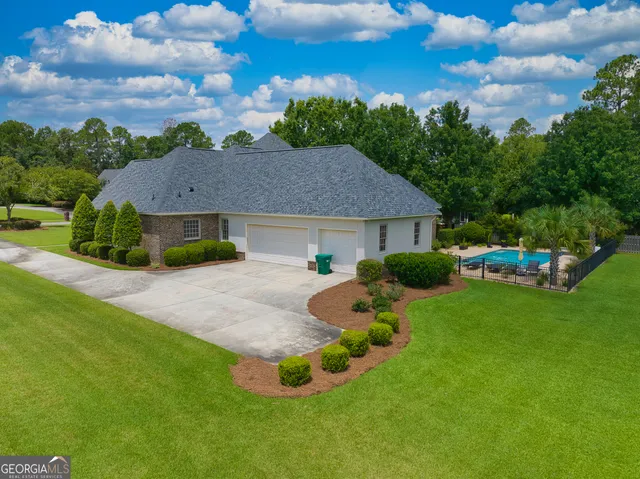 a bed room with furniture and wooden floor