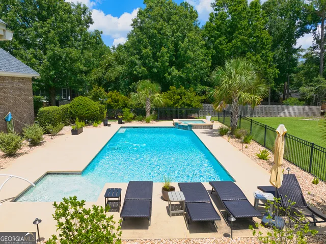 a en suite bathroom with a sink and a mirror