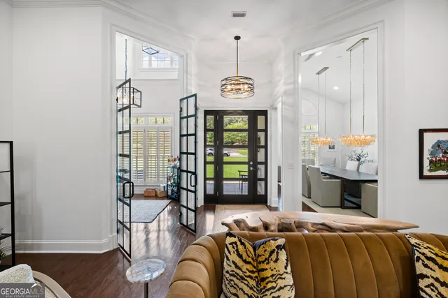 a kitchen with stainless steel appliances granite countertop a sink and cabinets