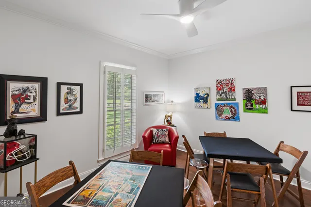 a kitchen with granite countertop a refrigerator and a sink