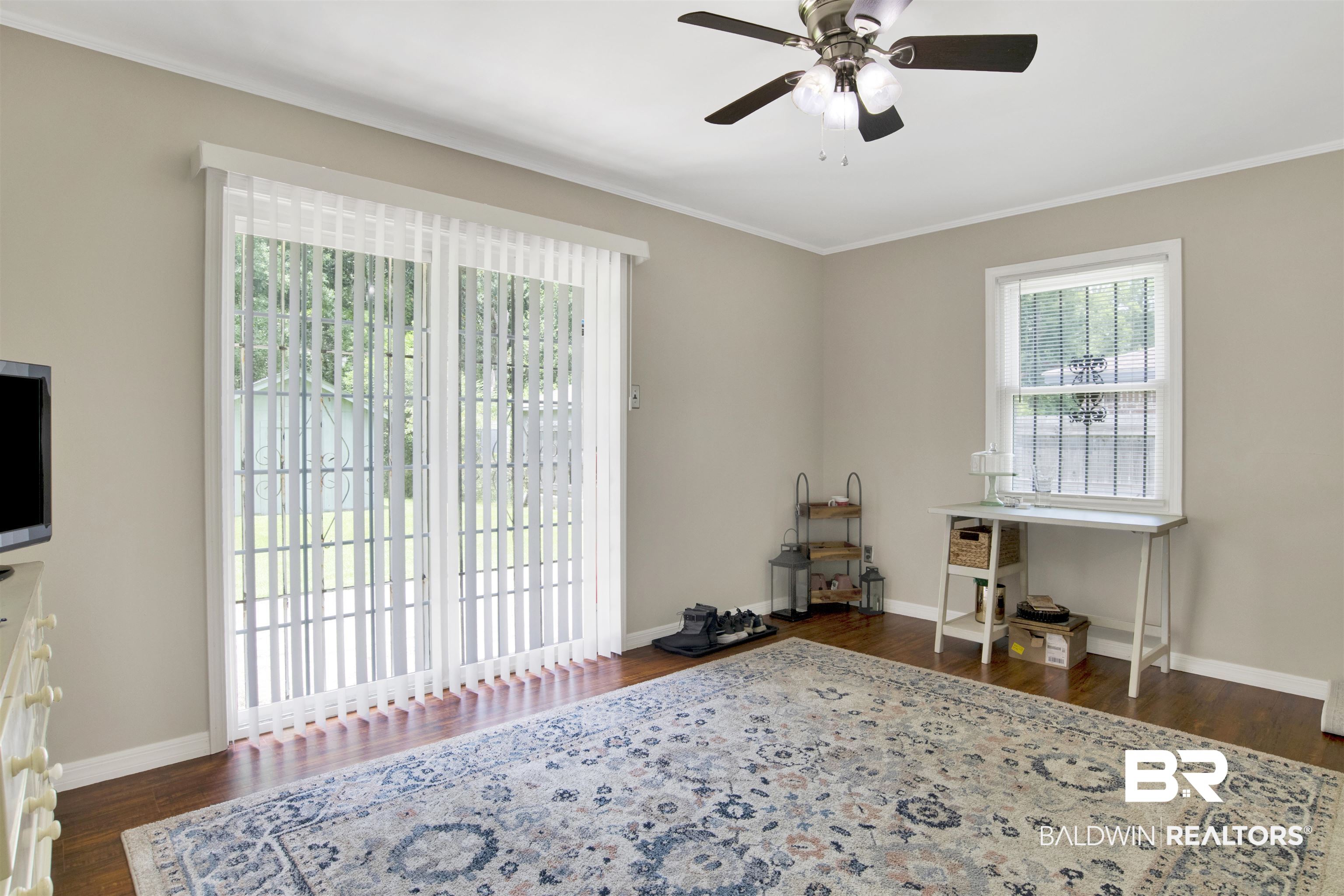 1476 Boudousquie Street Mobile, AL 36605 - Photo 23 of 34 Office space featuring crown molding, ceiling fan, and wood finished floors
