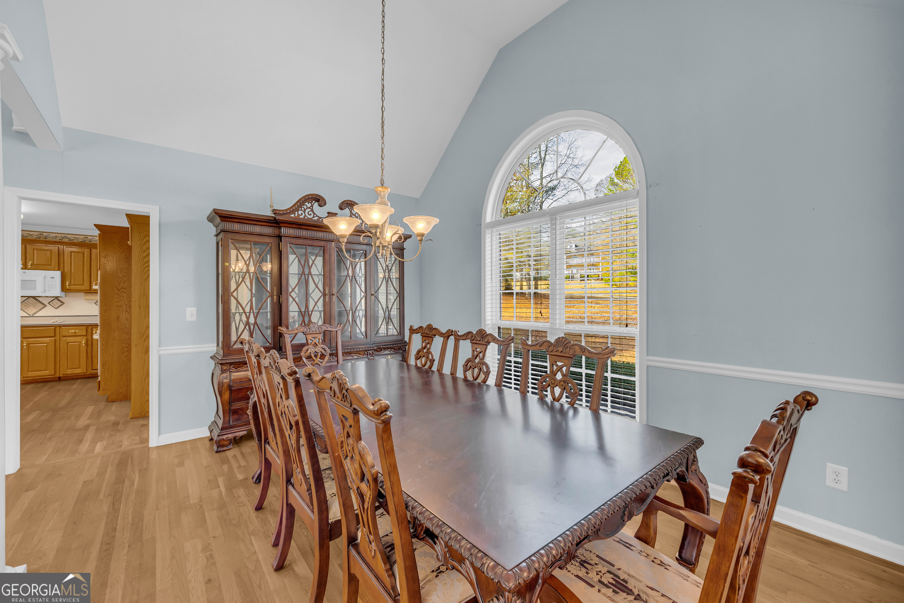114 River Bluff Hoschton, GA 30548 - Photo 14 of 72 a view of a dining room with furniture window and wooden floor
