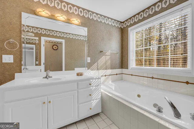 a view of a hallway with stairs