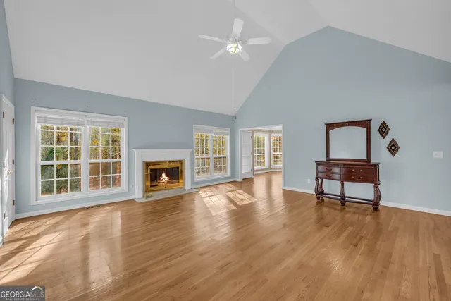 a view of kitchen and dining room with wooden floor