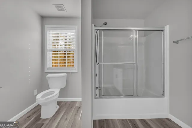 a view of a swimming pool and a yard