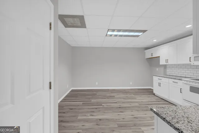 a view of outdoor space with wooden fence