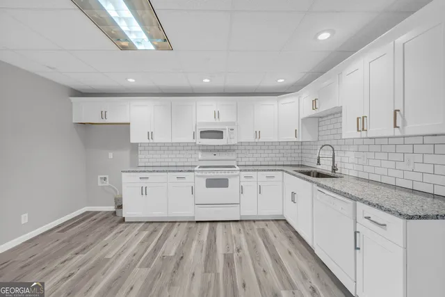 a view of outdoor space with signage and flags