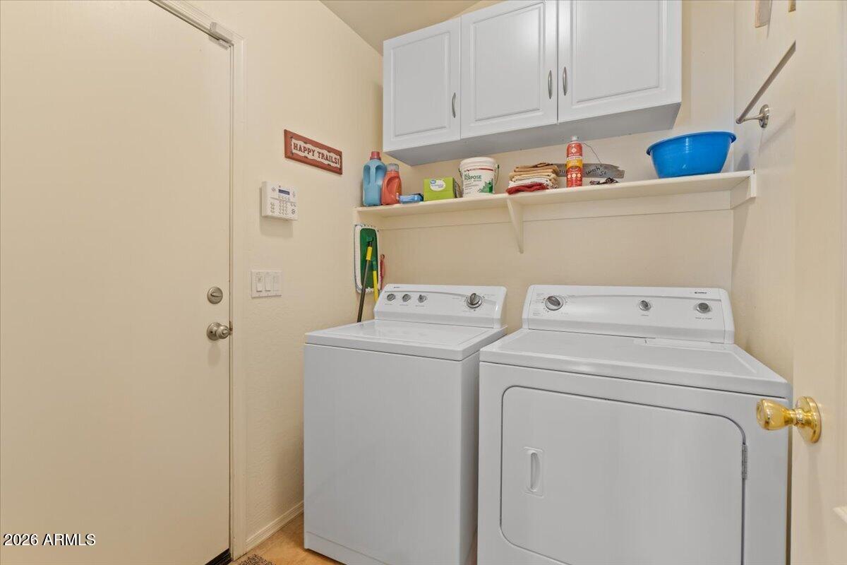 14234 South Capistrano Road Arizona City, AZ 85123 - Photo 28 of 42 a utility room with dryer and washer