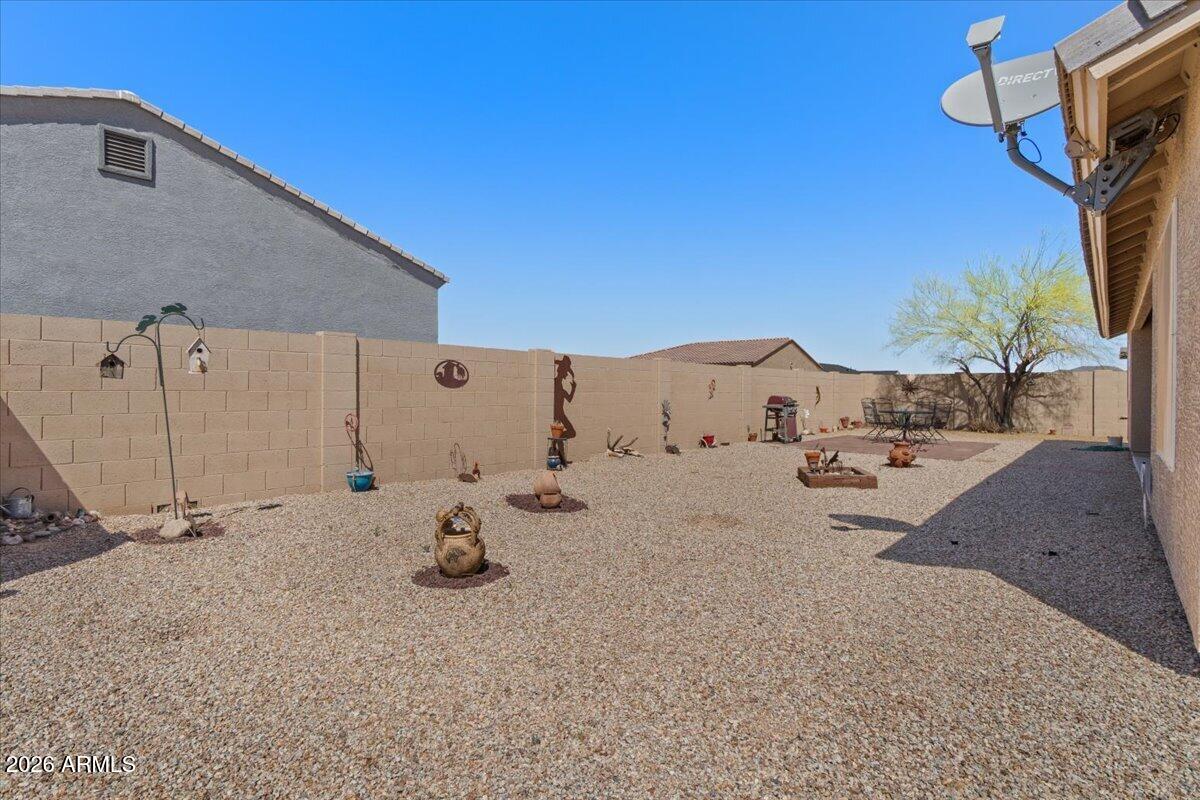 14234 South Capistrano Road Arizona City, AZ 85123 - Photo 38 of 42 a view of the house and outdoor space