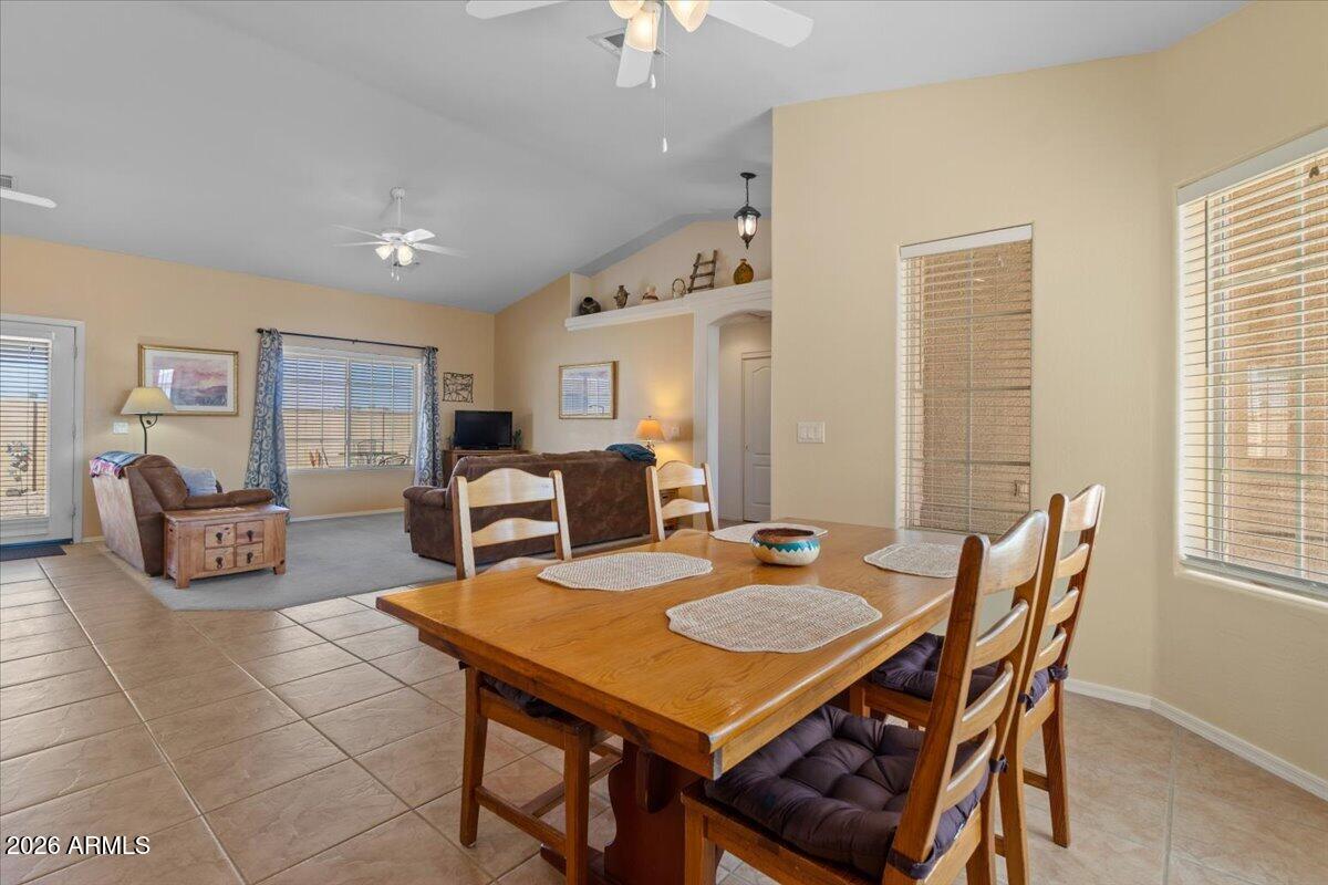 14234 South Capistrano Road Arizona City, AZ 85123 - Photo 7 of 42 a view of a dining room with furniture