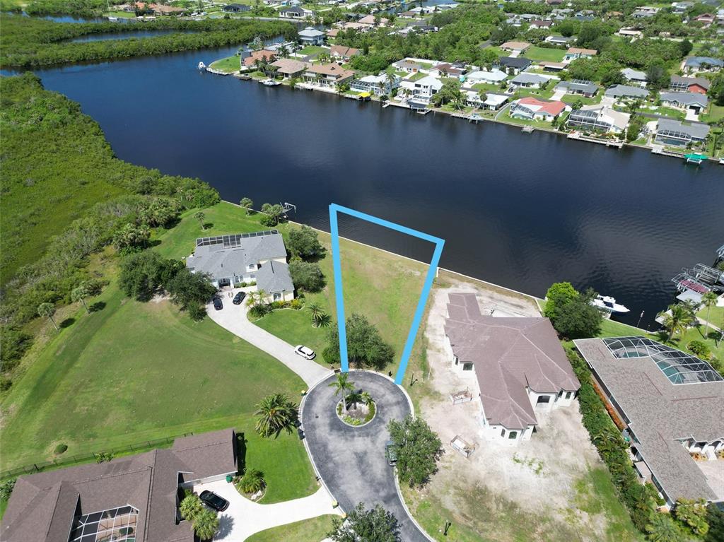 4361 Point Court Port Charlotte, FL 33948 - Photo 13 of 26 an aerial view of a house with a yard and lake view