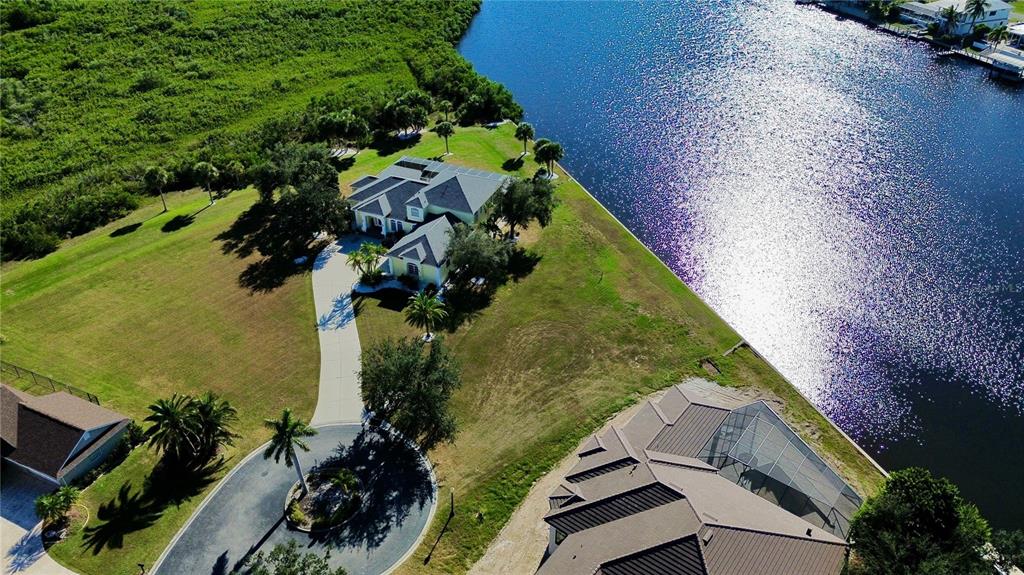 4361 Point Court Port Charlotte, FL 33948 - Photo 22 of 26 an aerial view of a house with a yard