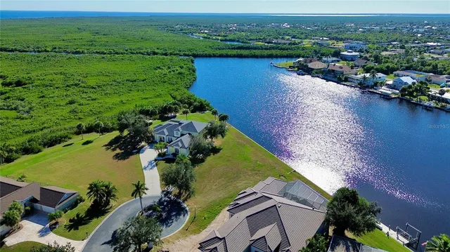an aerial view of lake residential house with outdoor space