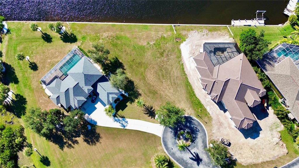 4361 Point Court Port Charlotte, FL 33948 - Photo 7 of 26 an aerial view of a house with a swimming pool