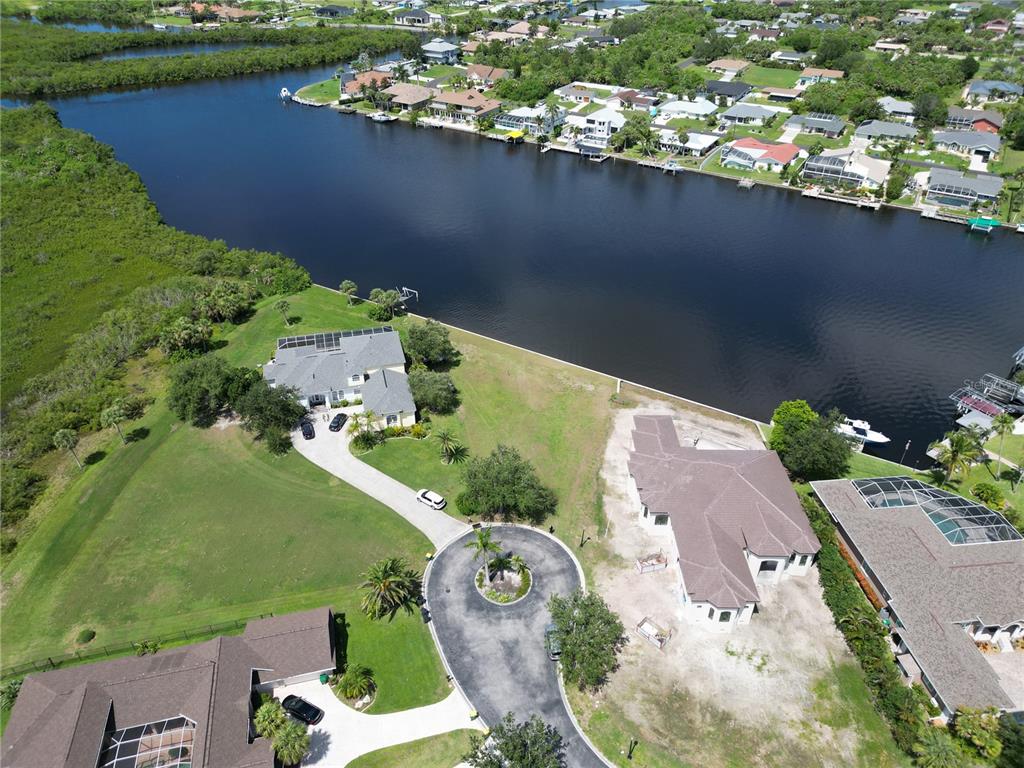 4361 Point Court Port Charlotte, FL 33948 - Photo 9 of 26 an aerial view of a house with a lake view
