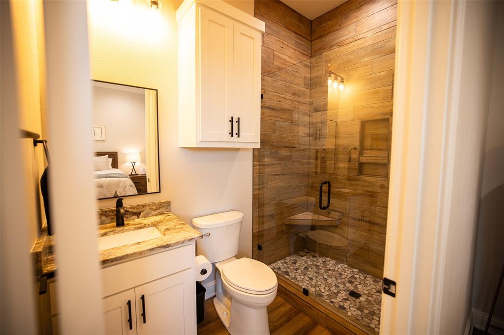 450 Northeast Loop 7 Athens, TX 75751 - Photo 24 of 38 a bathroom with a sink and a mirror